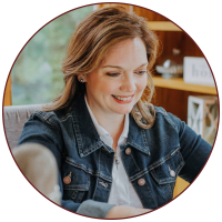 Rebecca Farris working at desk, founder of Well Planned Education